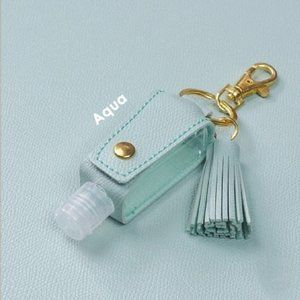 Keychain with hand sanitizer empty plastic bottle